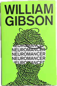 Neuromancer cover art: a face in a cybernetic visor